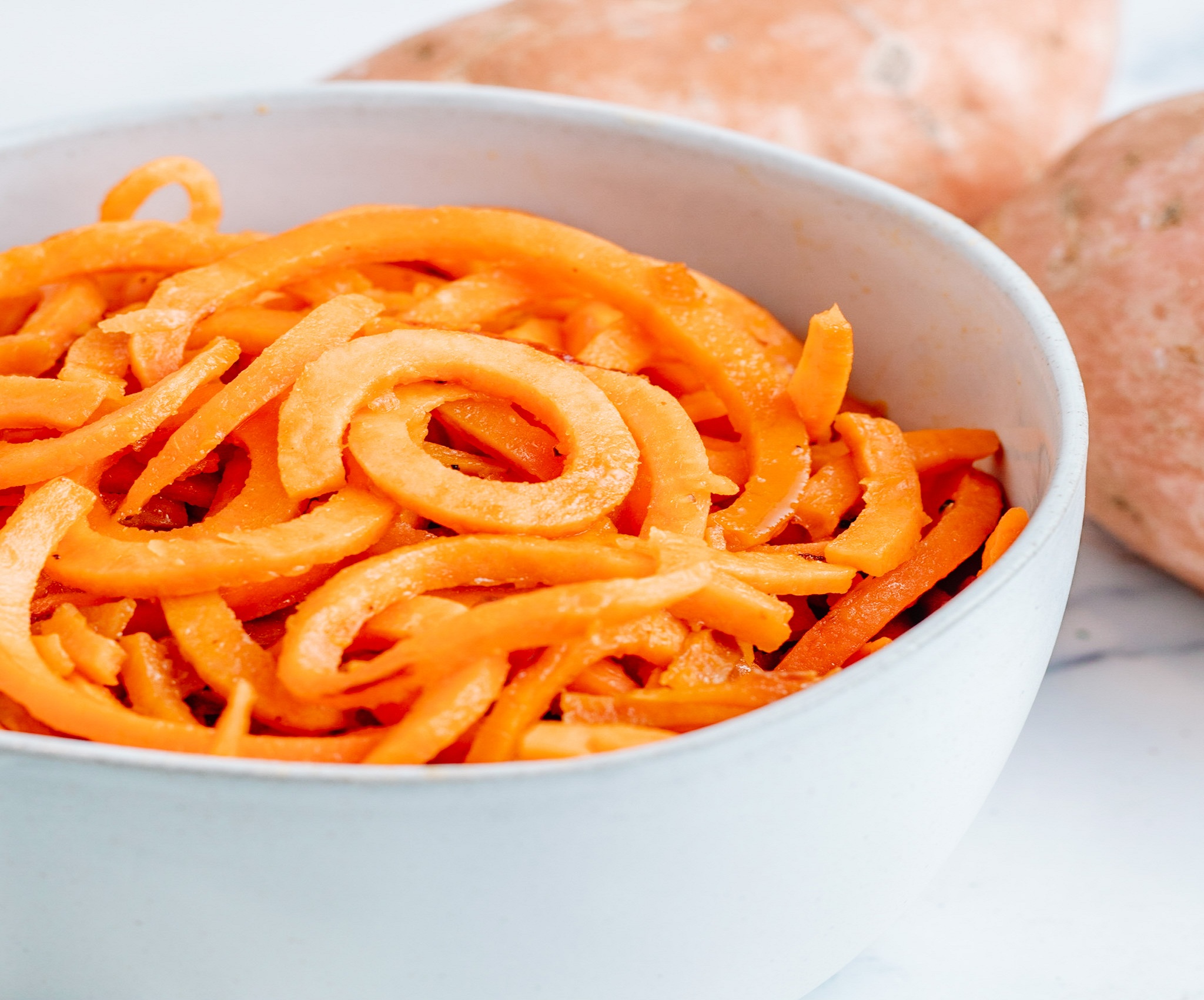 Sweet Potato Zoodles with Garlic and Spinach Common Threads